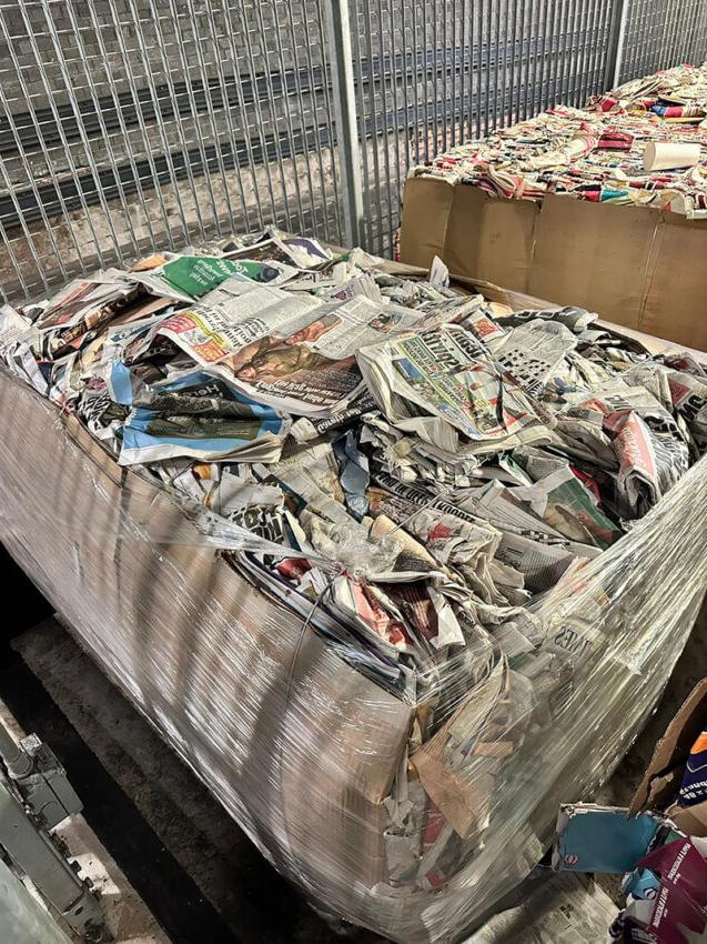 A bundle of newspaper waste in a depot at Euston rail station