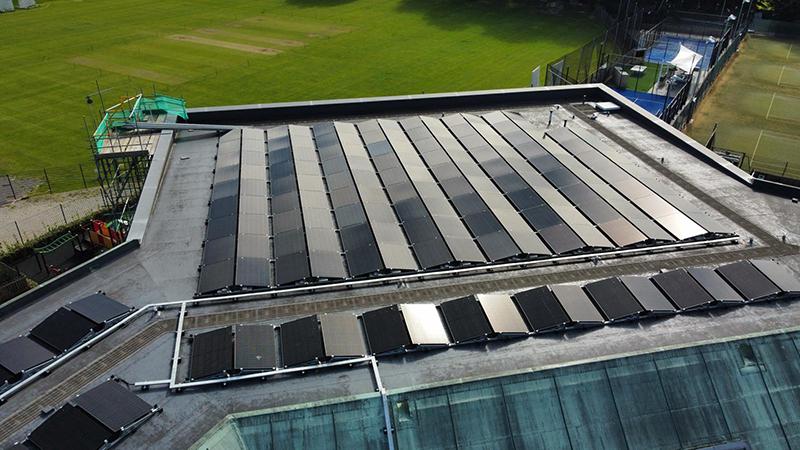 Solar panels on the roof of a David Lloyd leisure centre